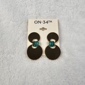 On 34th Gold Tone Disc Dangle Earrings With Green Accents
